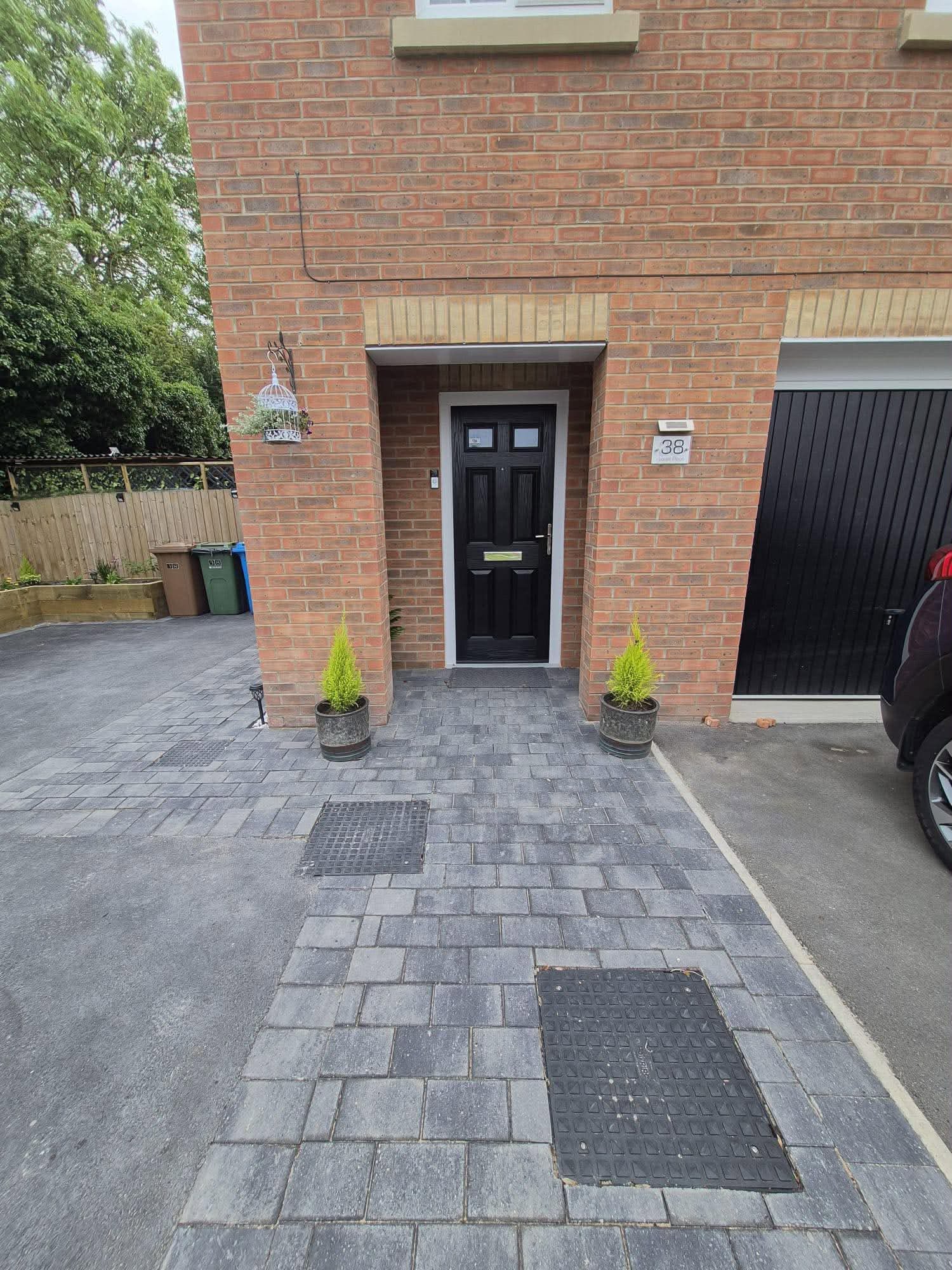 Block paving path, tarmac & raised sleeper beds — detail 2