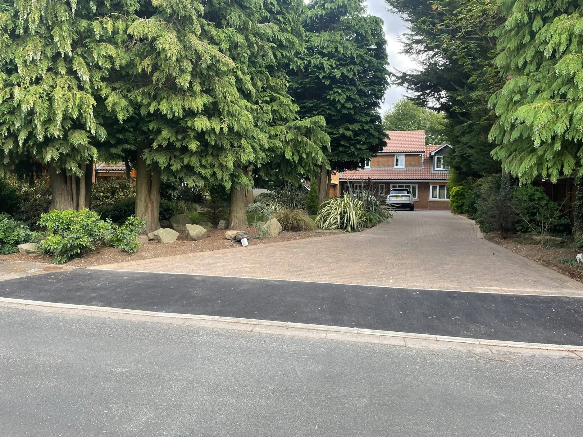 Charcoal block paving & drop kerb — main view